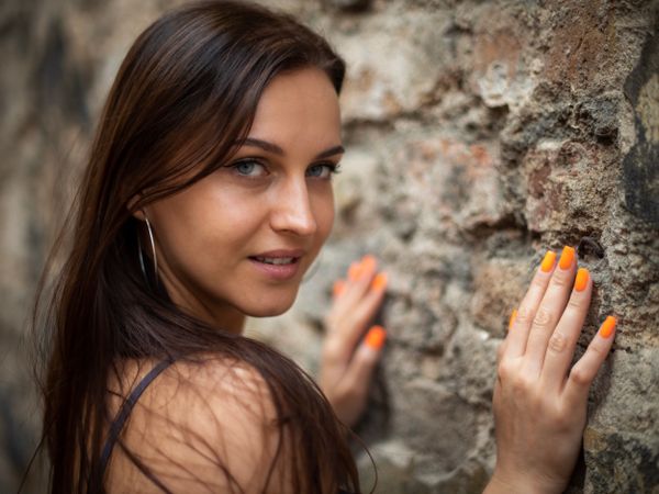 Bright coral almond nails for a beach vacation
