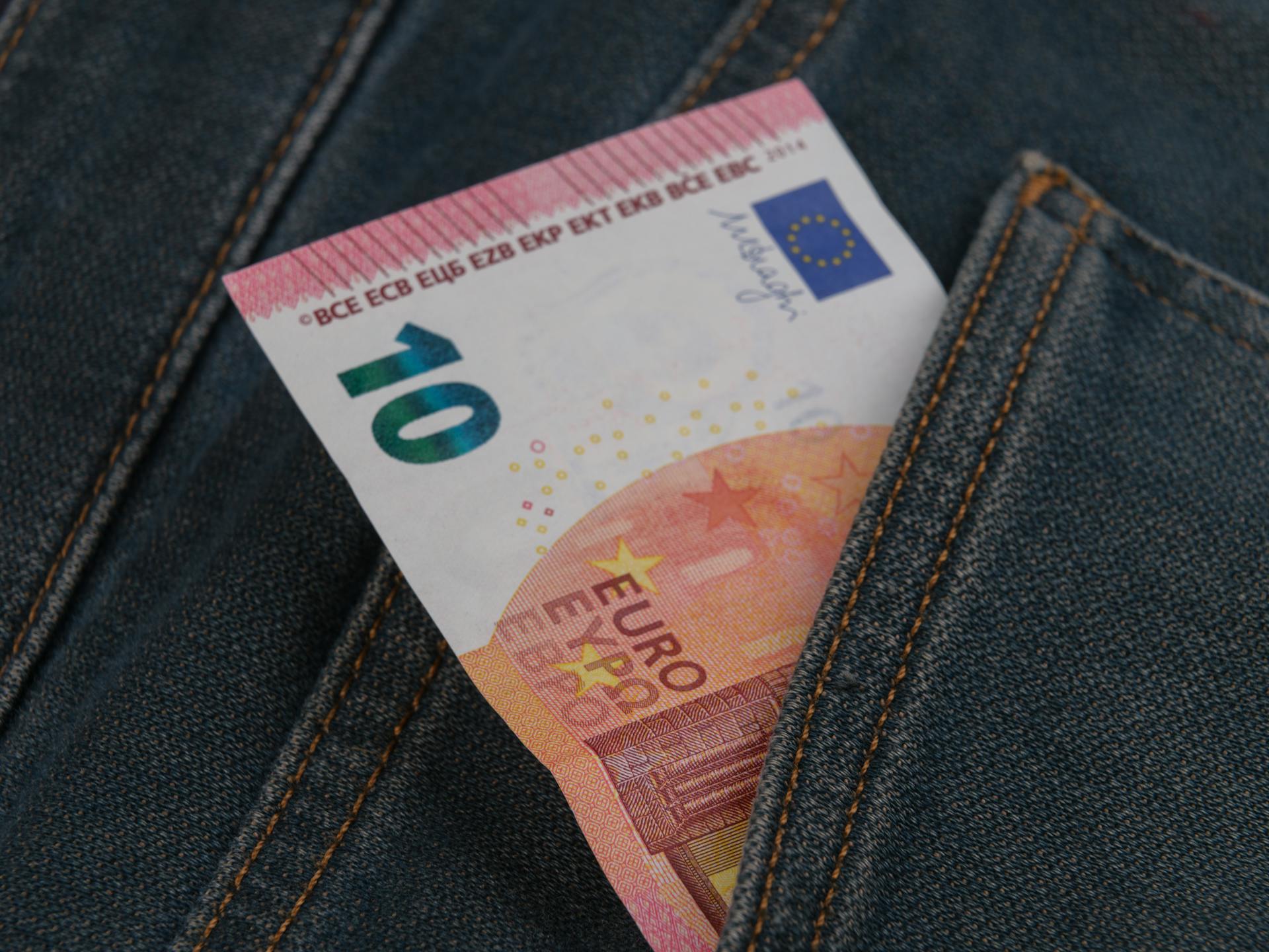 10 euro banknote in jeans pocket