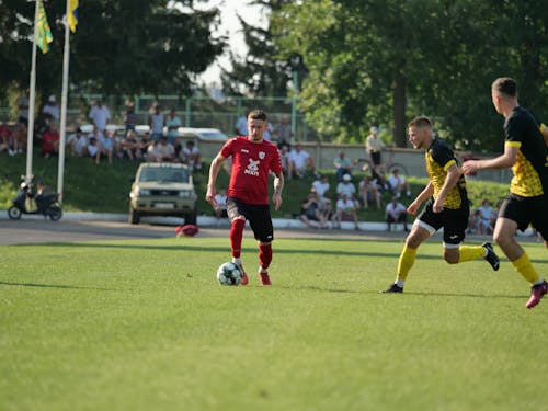 Men Playing Soccer 