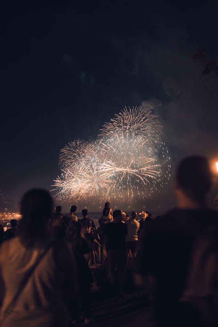 People Watching The Fireworks 