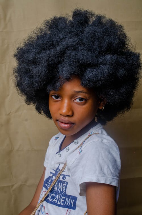 Portrait of Cute Black Teenage Girl with Afro Hair