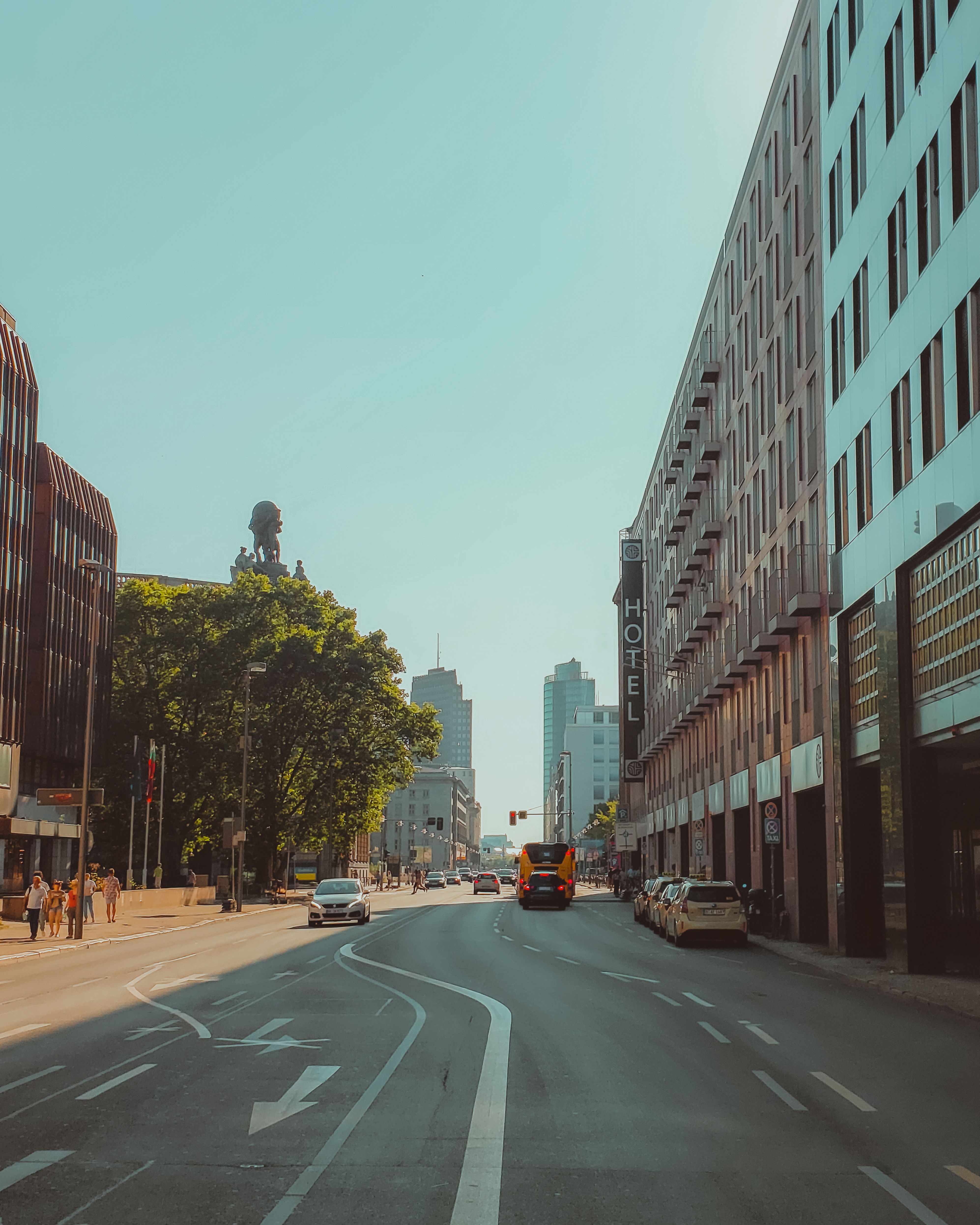 View of a Street between Buildings in City in Summer · Free Stock Photo