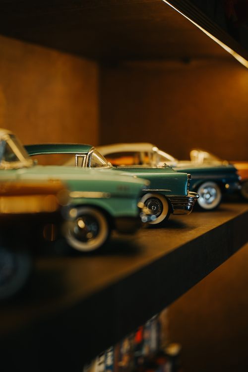Free Close-up of vintage toy cars displayed on a shelf with a retro feel in Ankara, Türkiye. Stock Photo