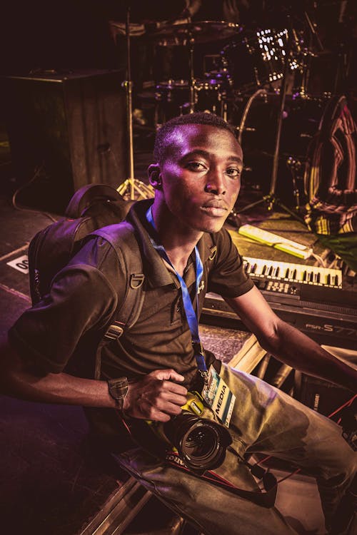 A Photographer on the Stage at a Concert