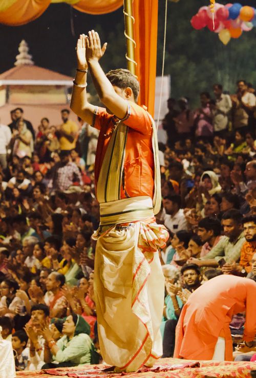 Free Vibrant cultural ceremony during a festival in Varanasi, showcasing traditional attire and rituals. Stock Photo