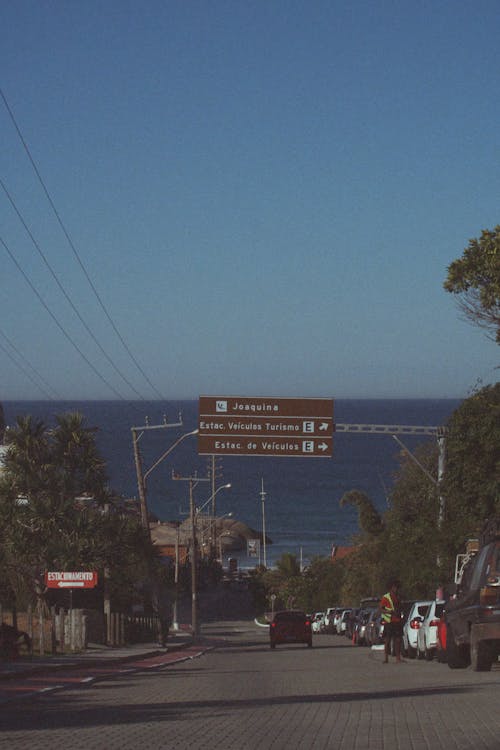 Road Sign over Downhill Street