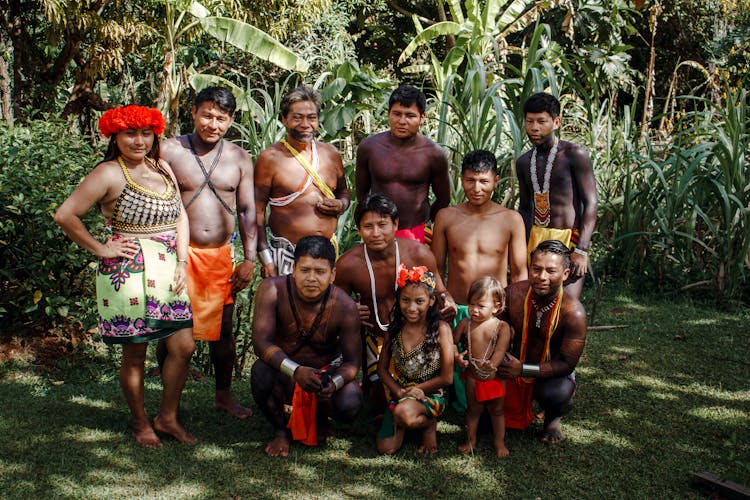 Tribal Family In A Tropical Forest