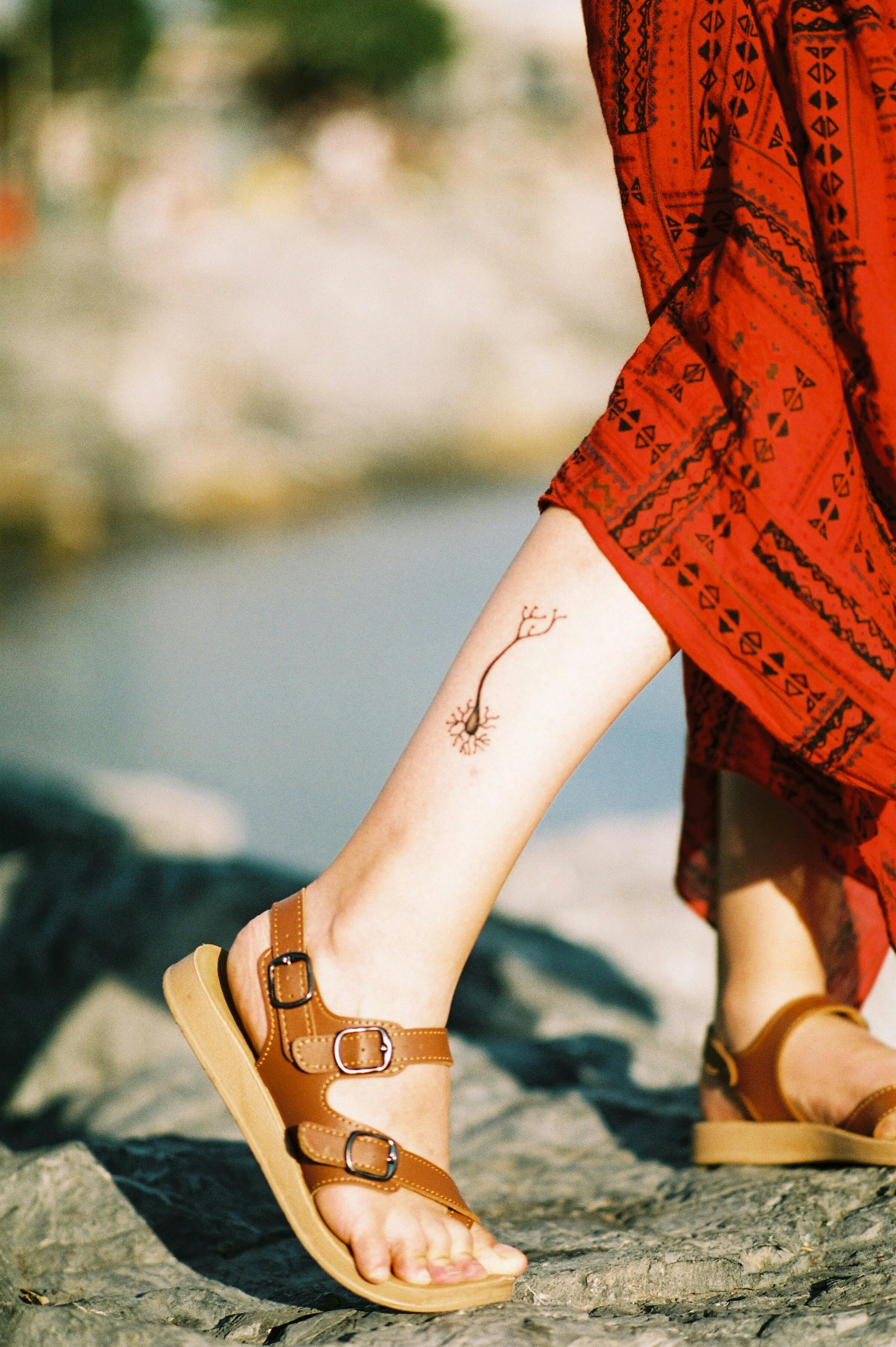 free photo of close up of tattoo on woman leg