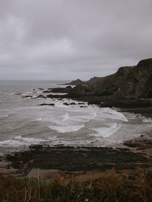 不安的海, 垂直拍攝, 岩石 的 免費圖庫相片