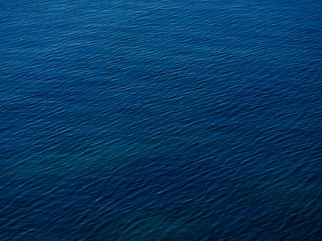 A serene aerial view of blue ocean water with gentle waves and a deep hue.