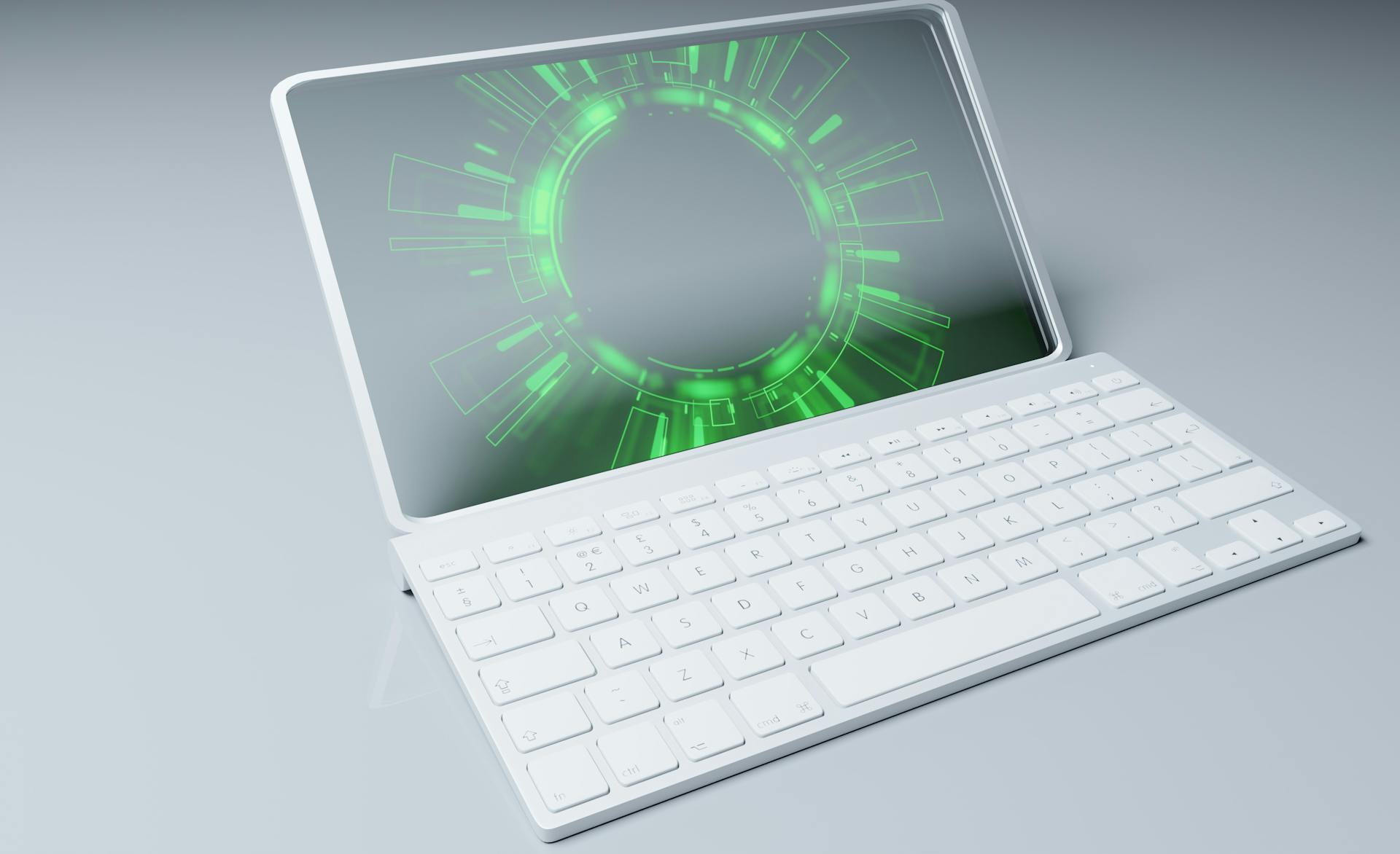 White tablet with neon green interface and keyboard on a surface.