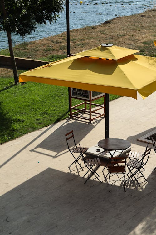 Chairs and Table under Umbrella