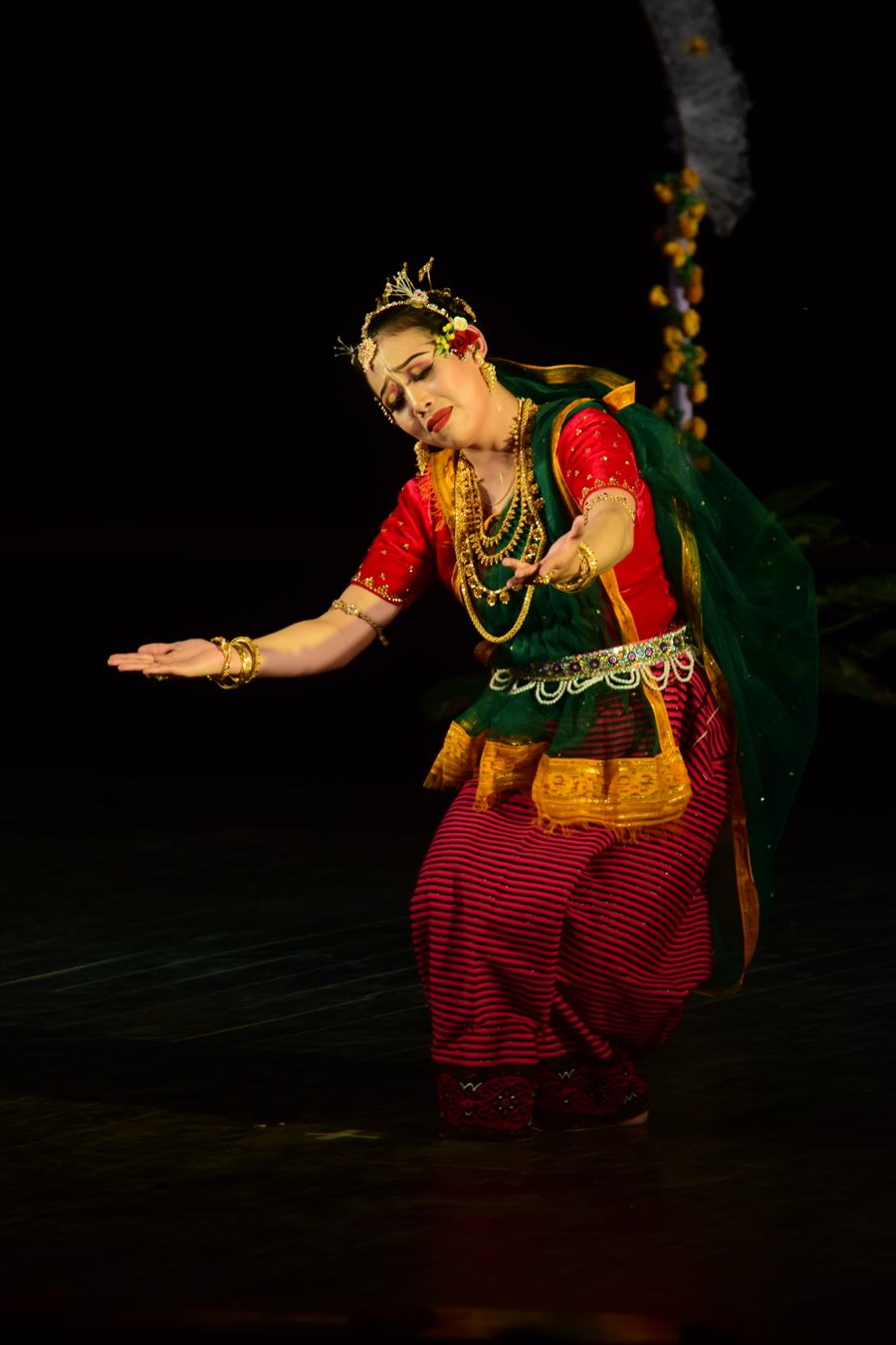 Dancer in traditional Indian attire performing