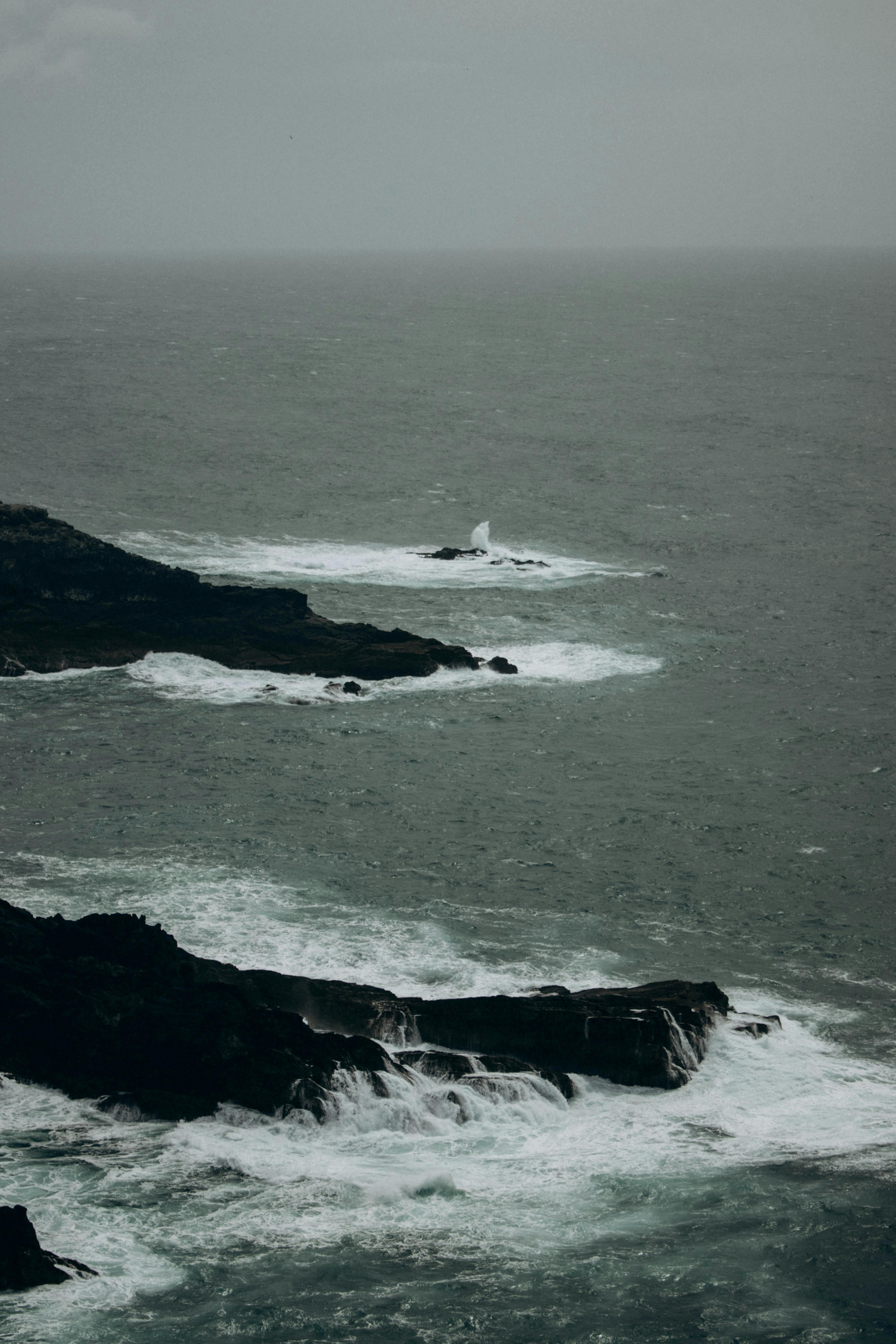 stormy waves crashing on rocks