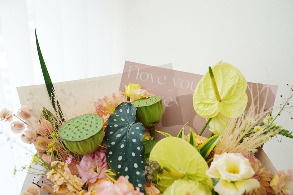Beautiful floral arrangement with 'I love you' card, perfect for romantic occasions.