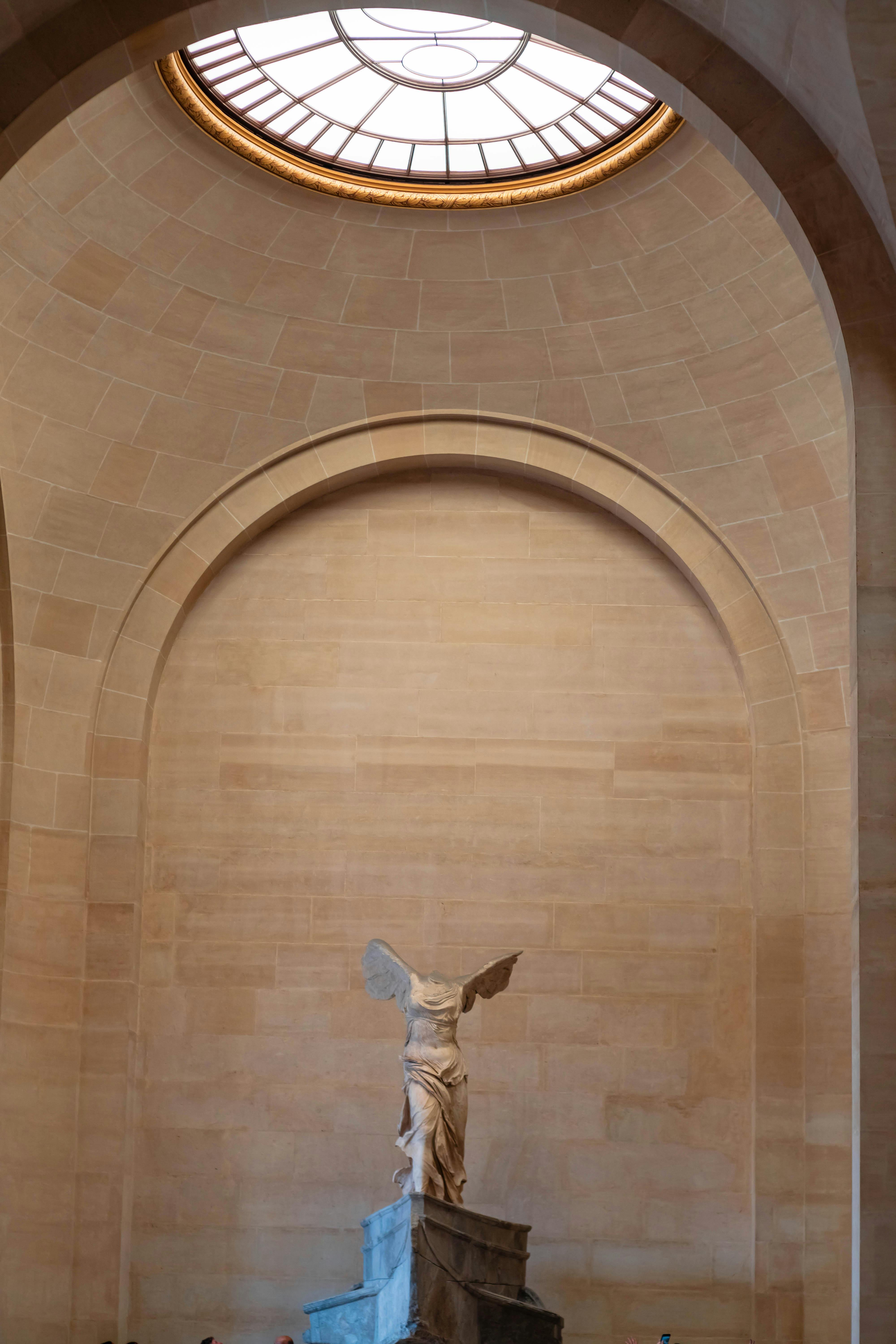 winged victory of samothrace with head and arms