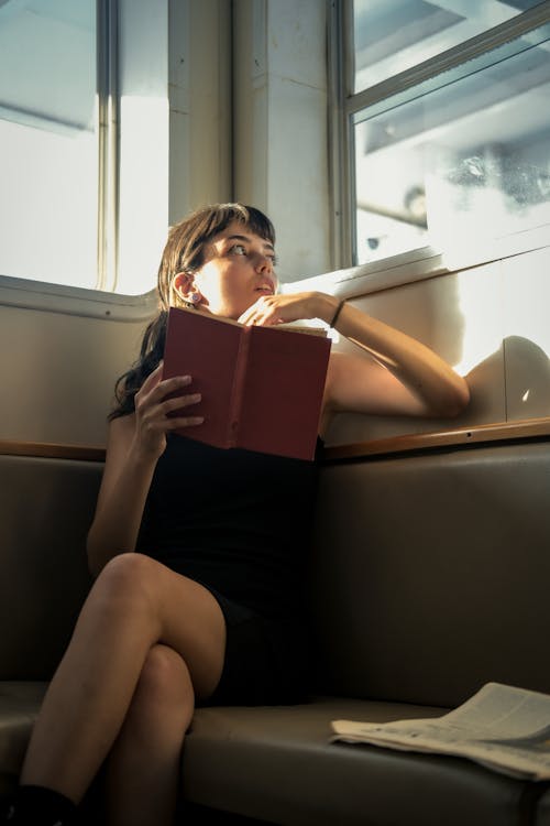Woman in Travel Reading Book