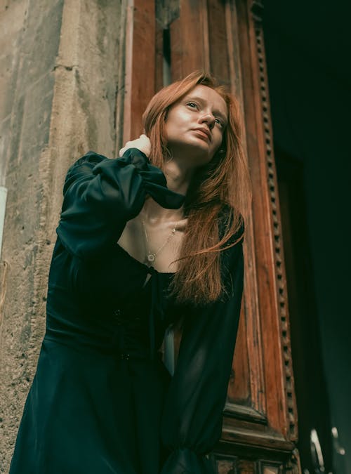 Portrait of Woman Posing in Black Dress 