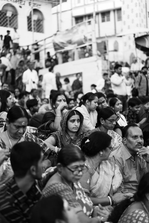 Free A black and white image of a traditional Indian crowd in a bustling city setting. Stock Photo