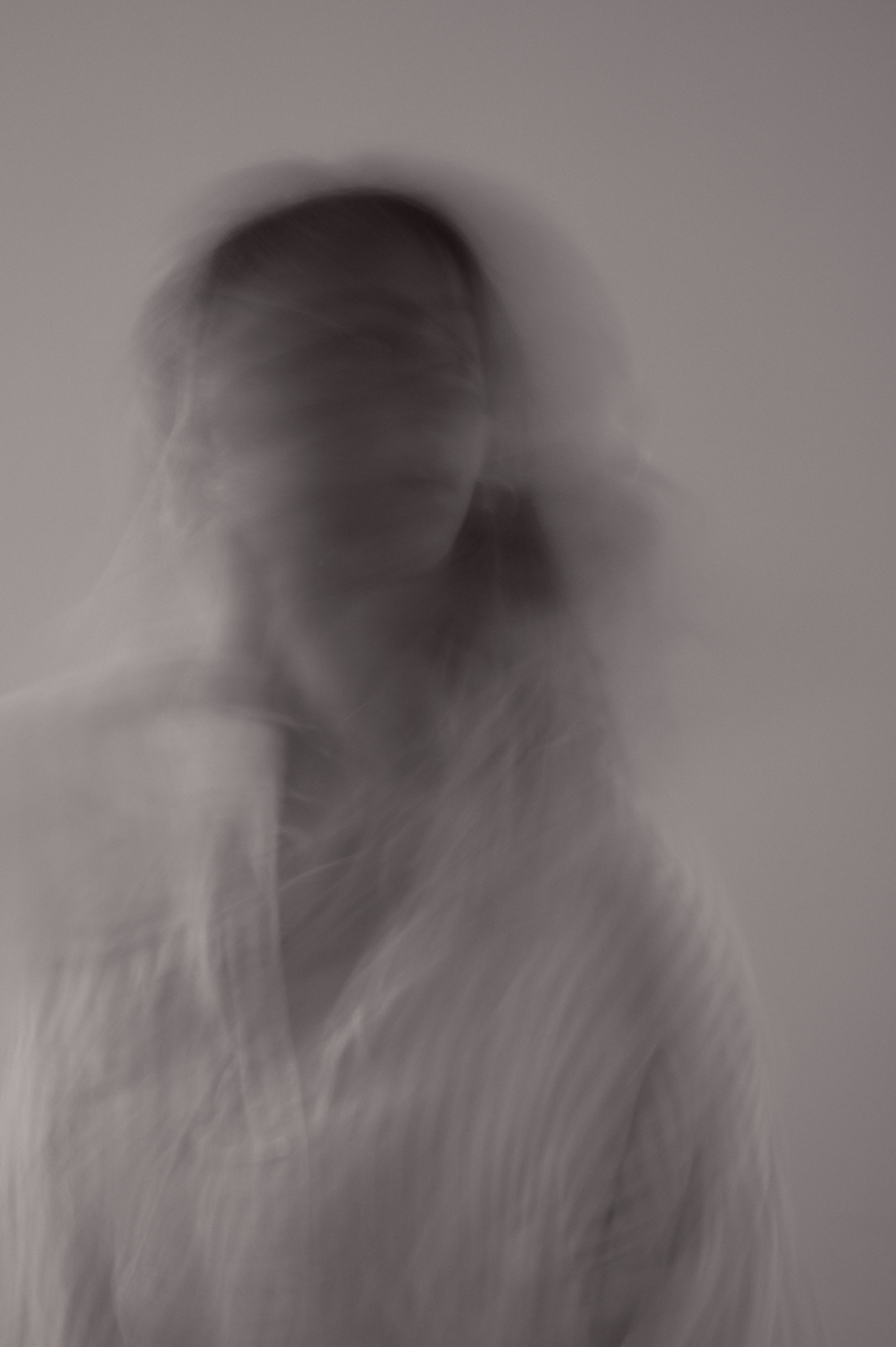 Portrait of Woman in Motion in Black and White · Free Stock Photo