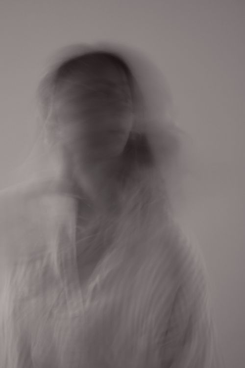 Free Abstract black and white portrait with motion blur creating an artistic effect. Stock Photo
