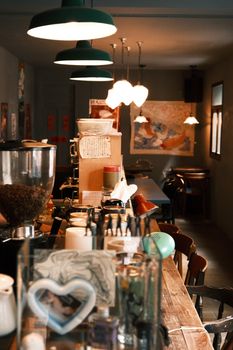 Warm and inviting cafeteria interior with wooden furniture and ambient lighting.