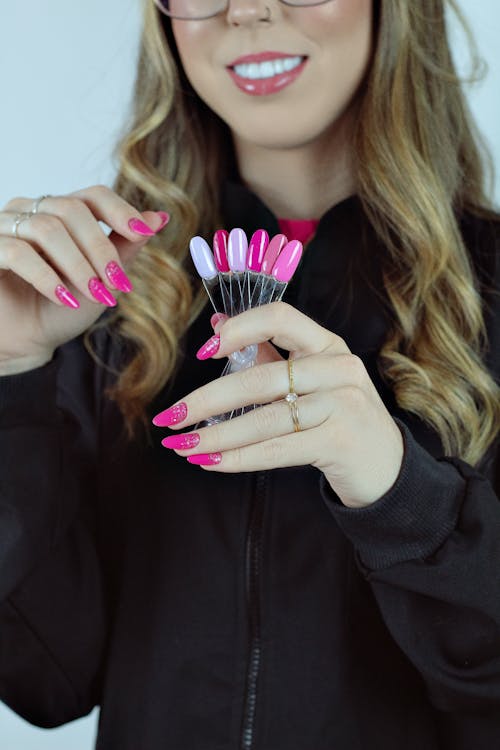 Woman Holding Nail Accessories