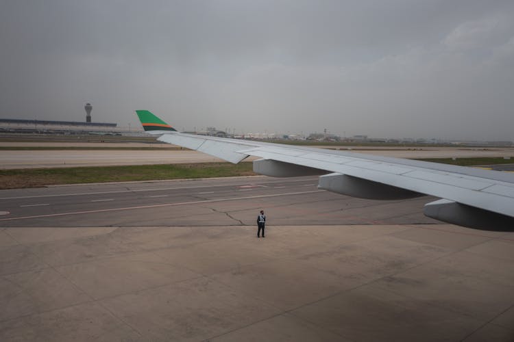 Man Working On Runway