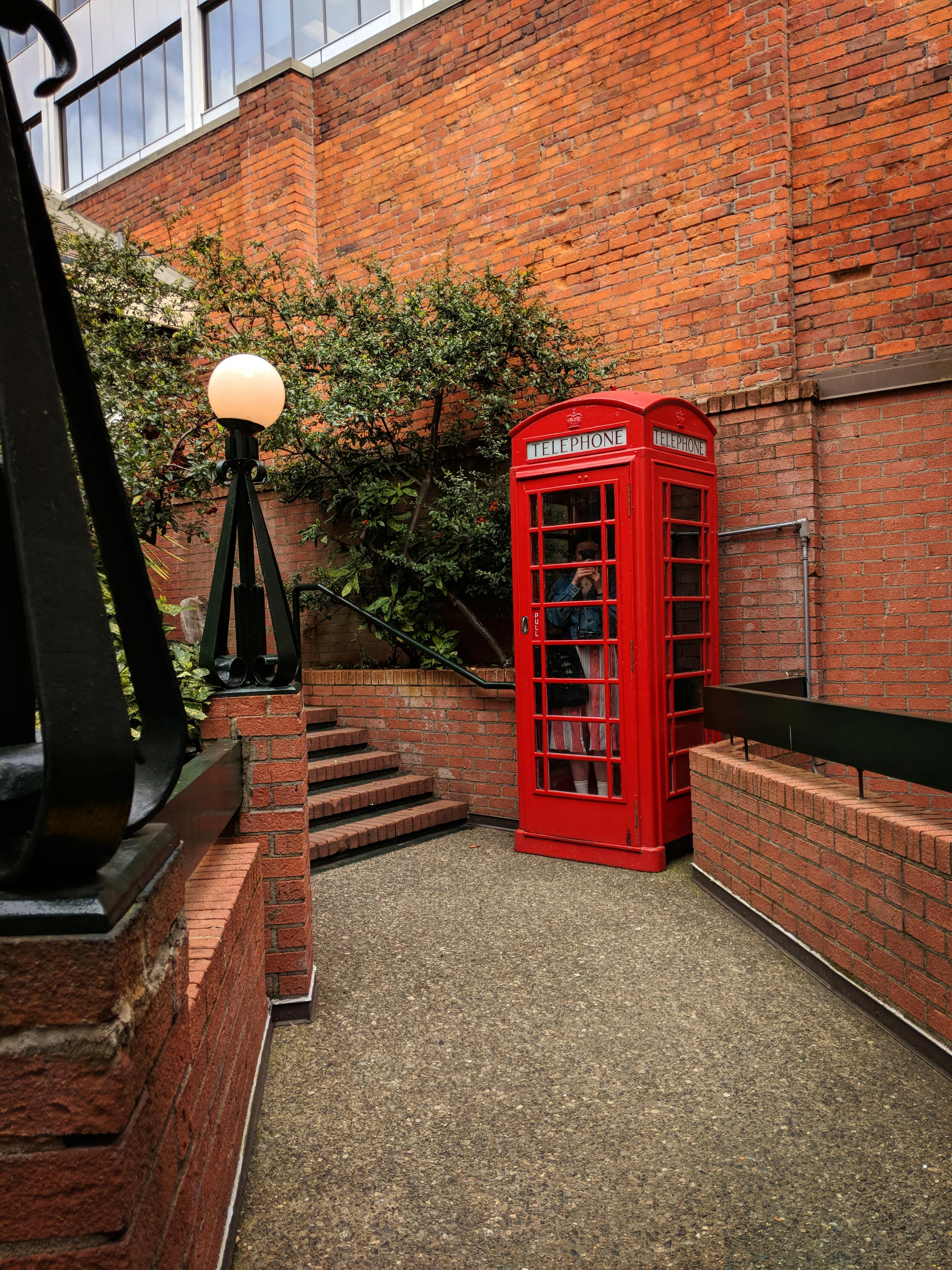 Free stock photo of brick, phone booth, telephone booth