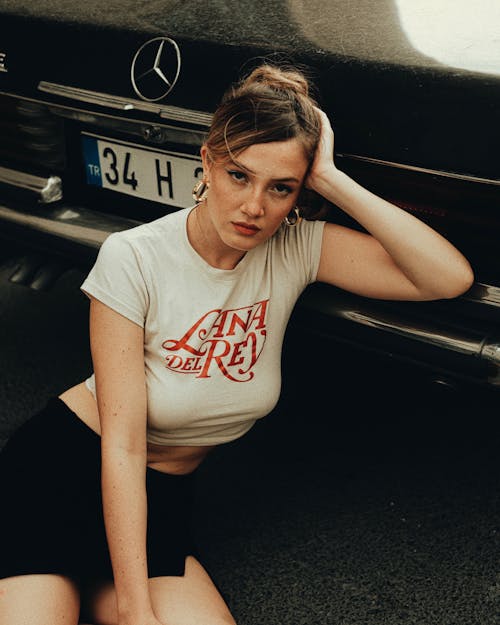 Woman in Cropped Tshirt and Black Mini