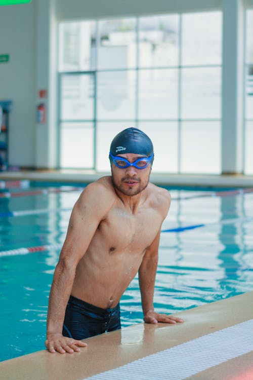 Foto d'estoc gratuïta de atleta, gorra nedadora, home