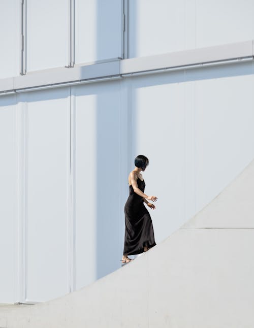 A Woman Walking Up the Stairs