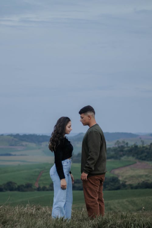 Couple Standing on Field