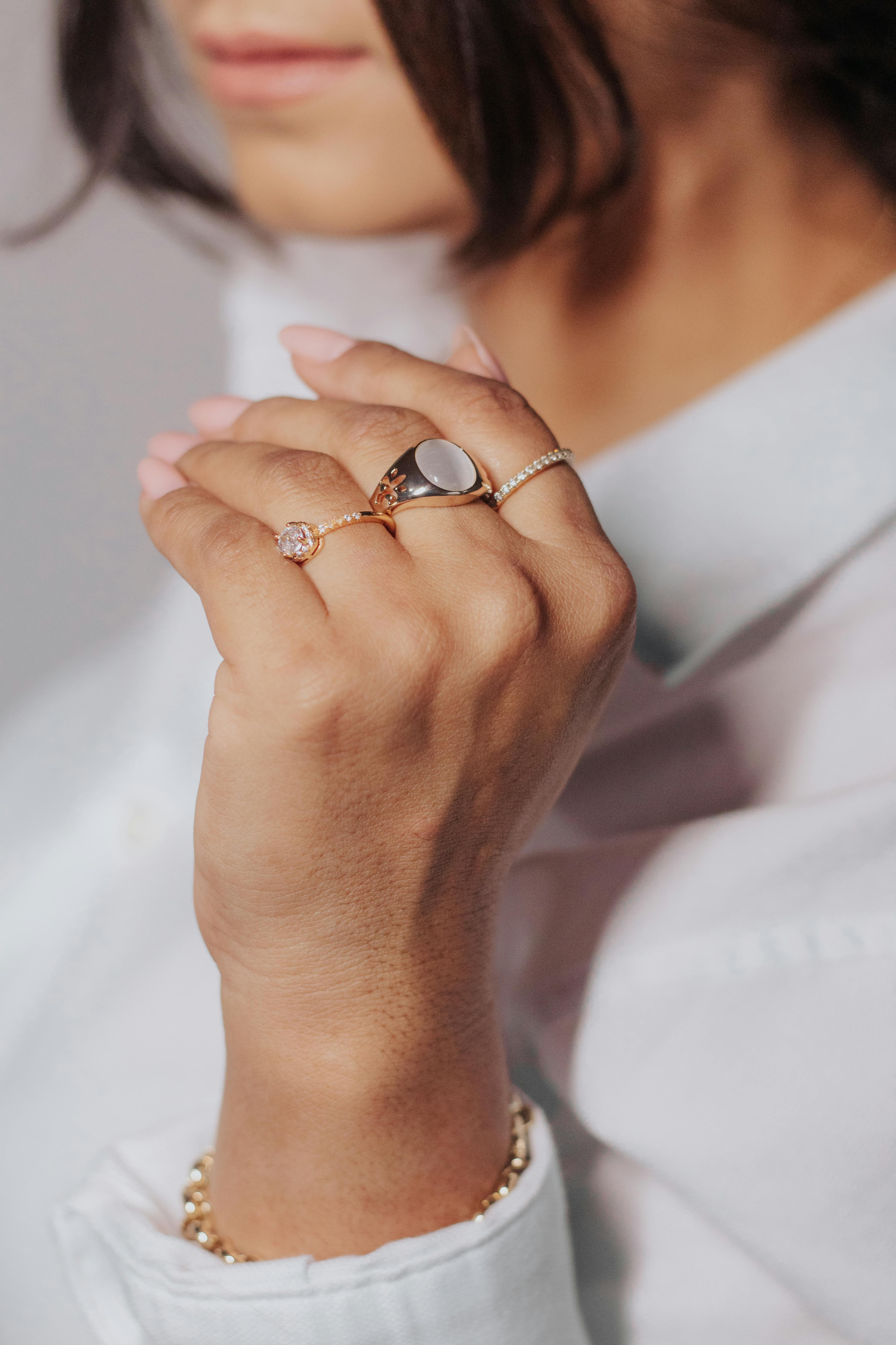 golden rings on woman hand