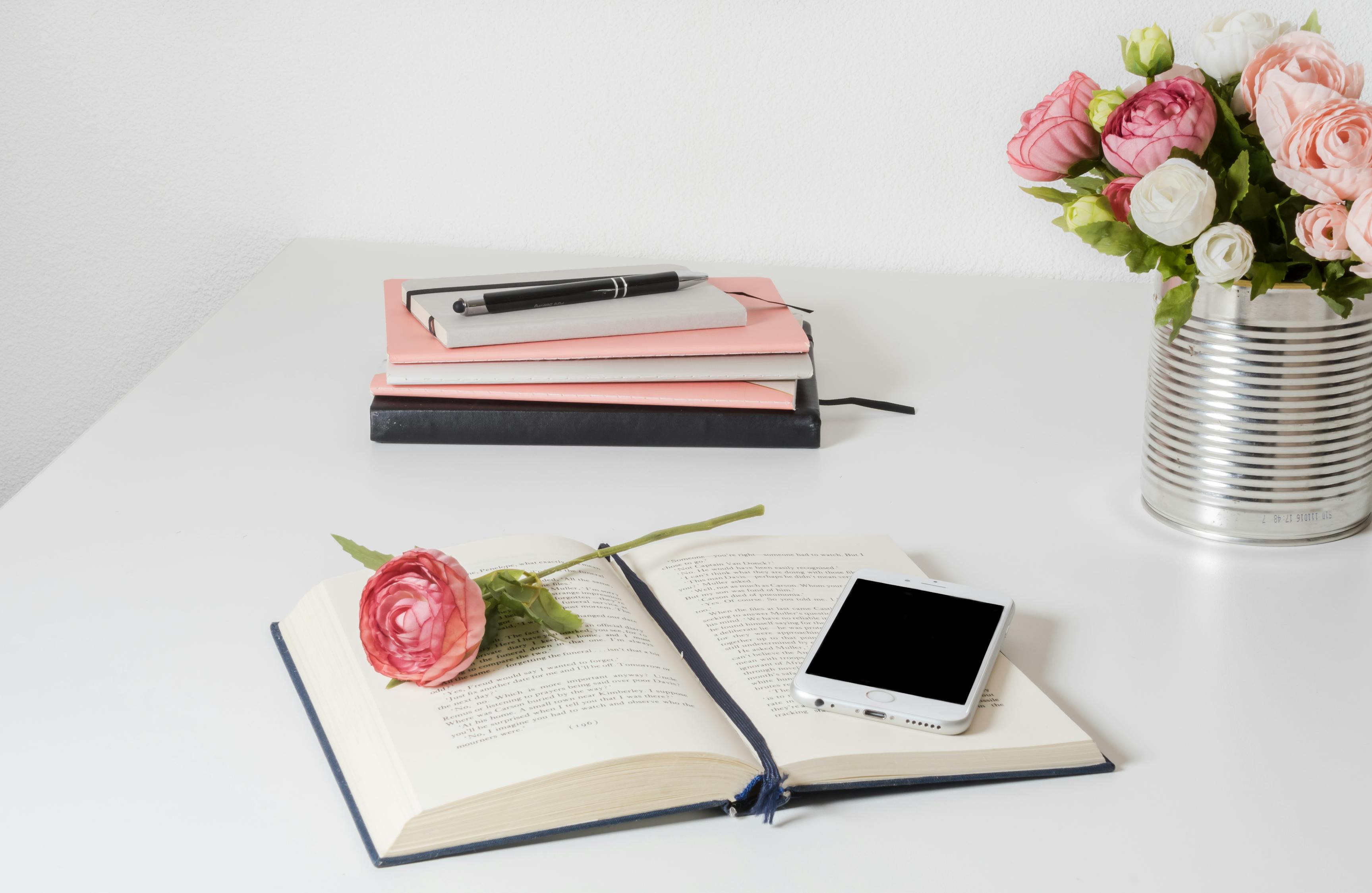 Book On A White Wooden Table