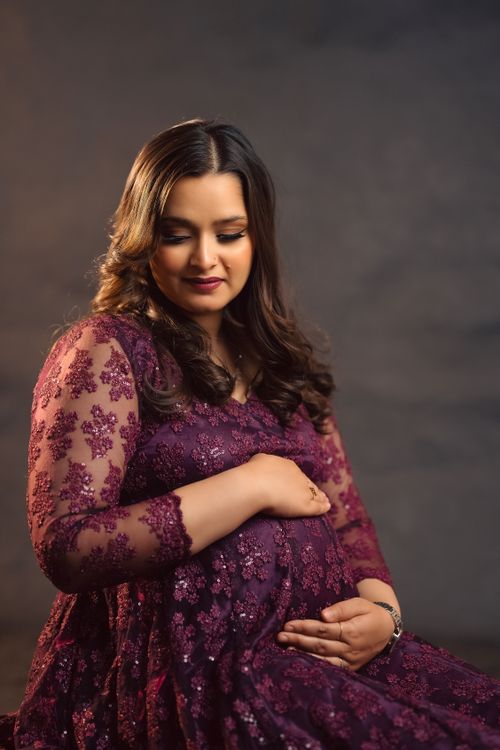belly purple dress 10 Belly-Concealing Outfits for Ladies with Big Belly Svelte Magazine