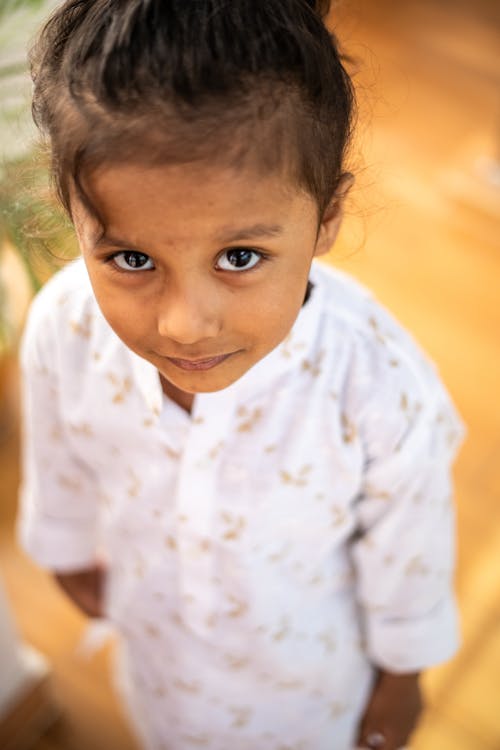 Portrait of a Vute Little Girl in Pajamas