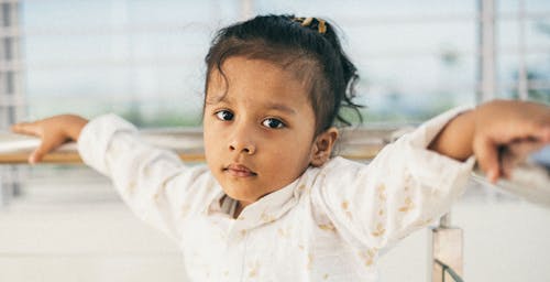 Close-Up Portrait of Little Brunette Girl