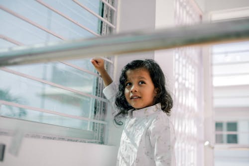 Little Girl in a Modern Building