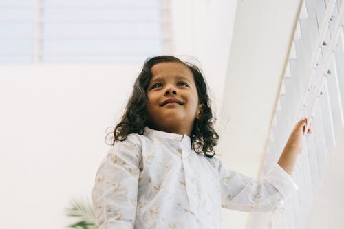 Portrait of a Little Girl Wearing a White Shirt