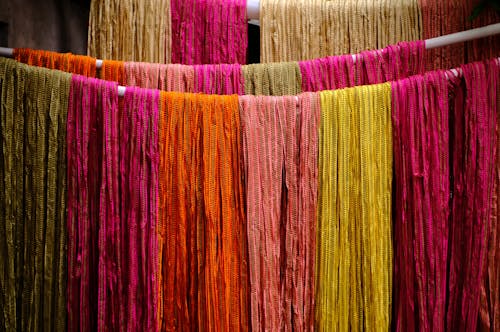 Colorful Fabrics Hanging from Ropes