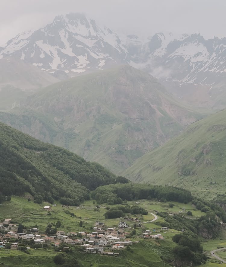 Mountain Panorama With A Village In A Valley