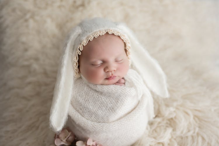 Picture Of A Newborn Baby Wrapped In A Blanket With Bunny Ears 