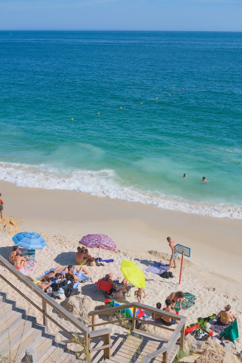 Free People enjoying a sunny day at Portinho da Arrábida in Setúbal, Portugal. Stock Photo