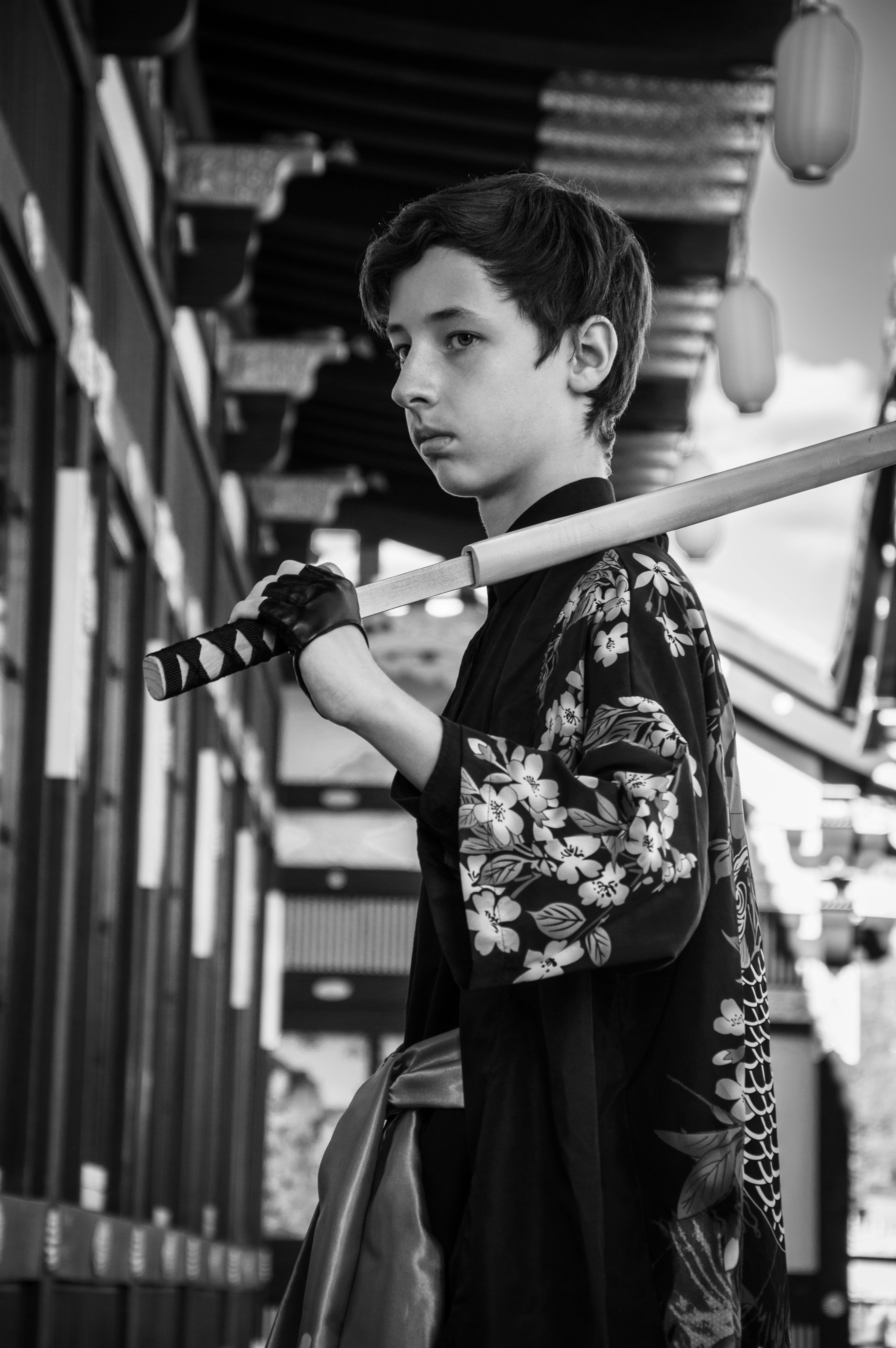 Boy in Traditional Japanese Clothing Holding Swords · Free Stock Photo