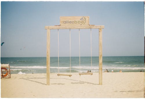 A Wooden Swing on the Beach 