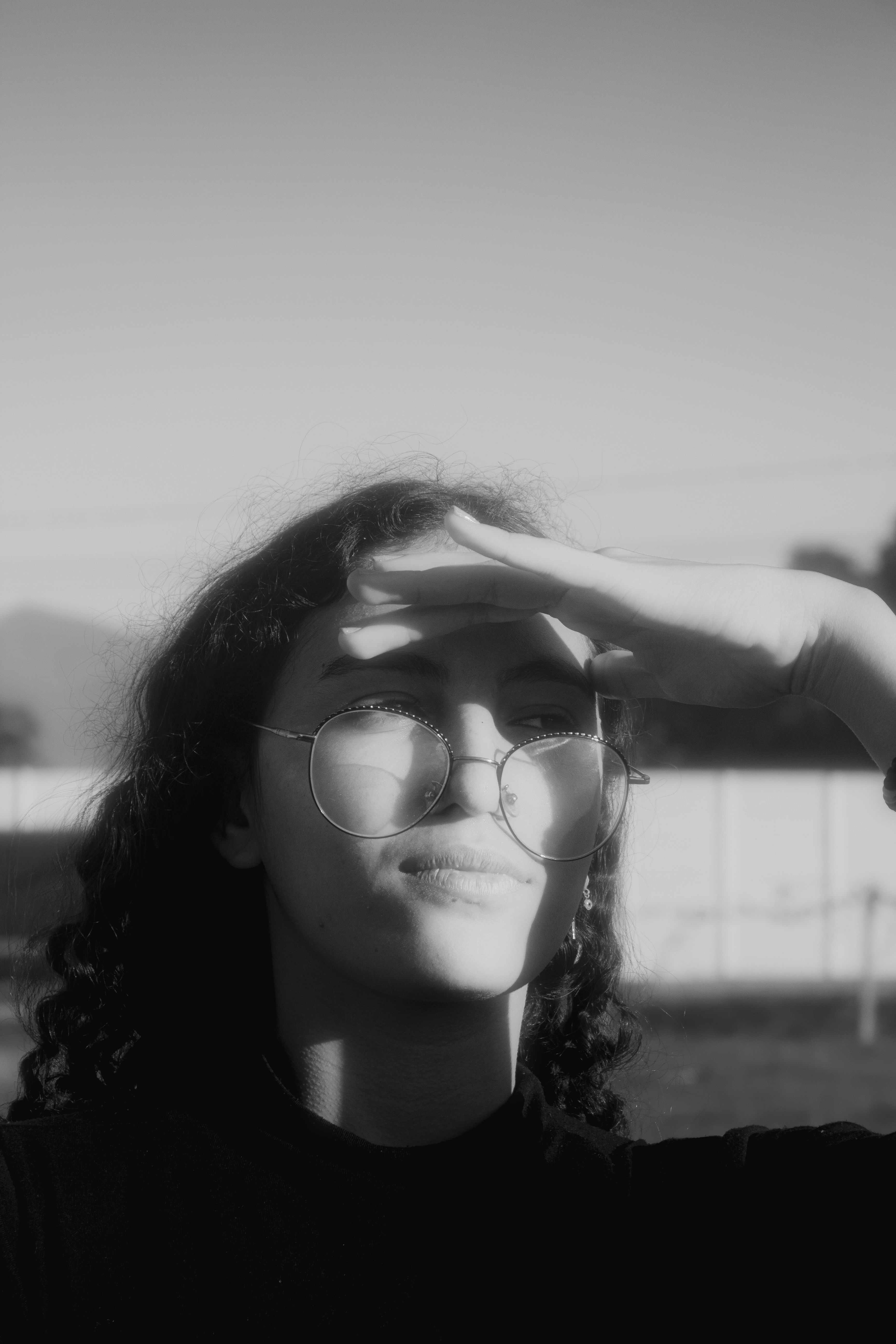 Woman in Eyeglasses and with Hand on Forehead · Free Stock Photo