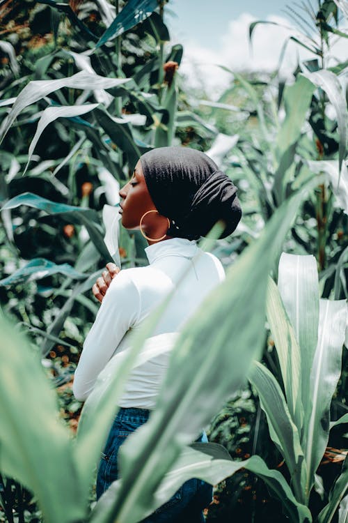 Back of a Woman Standing in a Field