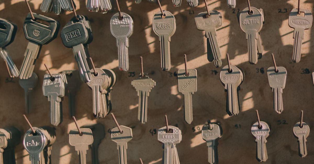 A Variety of Keys Hanging on Hooks · Free Stock Photo