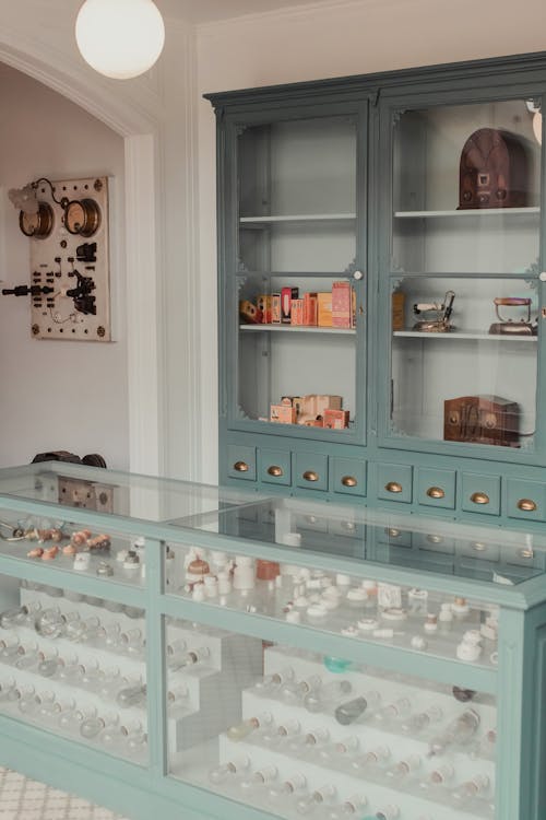 Glass Cabinets with Light Bulbs 
